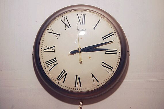 Vintage United Clock Corp Industrial Wall Clock by Vintiquesco