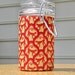 Small Glass Stash Jar : Latch-Top Jar - Spider Monkey Print in Red and Gold