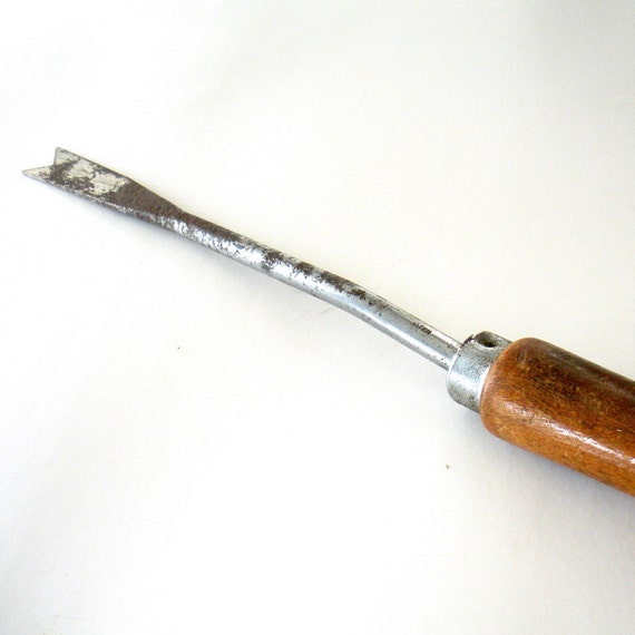 antique dandelion puller