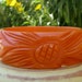 RESERVED MONET PATRICK Carved Pumpkin Orange Flower Bakelite Bangle