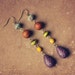 RESERVED FOR CHLOE - tala. a pair of jewel toned beaded earrings.