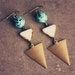 RESERVED FOR JULEA - thora. a pair of teal and white geometric earrings.