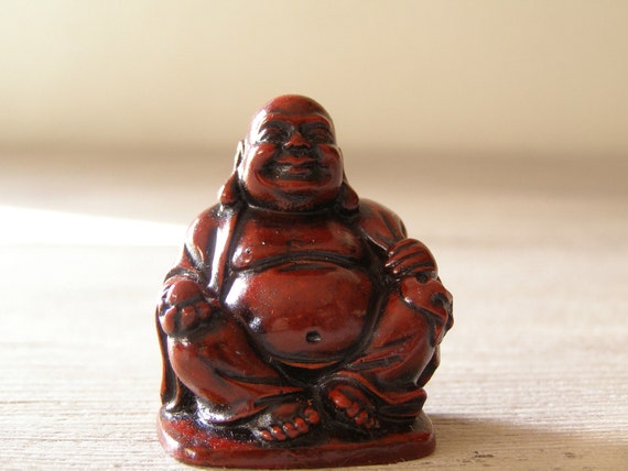 miniature sculpture of buddha