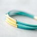 Pastel colors Leather Bracelet with 6 Golden tubes by pardes israel