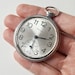 Vintage pocket watch Molnija, Soviet time