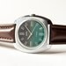 Unisex wristwatch Zarja, forest green dial, silver, brown tones, Soviet Era