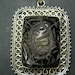 Vintage 925 Silver and Dark carved Agate Ornate Pendant.