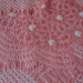 Coral hand-tied shibori silk featuring a one-off pattern.