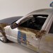 1990s Ford 1/24 scale model police car in silver