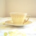 Art Deco 1930s Burleigh butter cream yellow with gold teacup and saucer by Burgess & Leigh of England