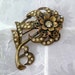 Vintage Gold tone Rhinestone Flower Brooch