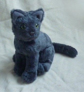 dark grey cat stuffed animal