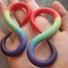 INFINITE RAINBOW Gauges Plugs. 2g, 0g, 00g, 7/16", 1/2", 9/16", 5/8". Available as Fake Faker Faux Plugs Gauges Also.