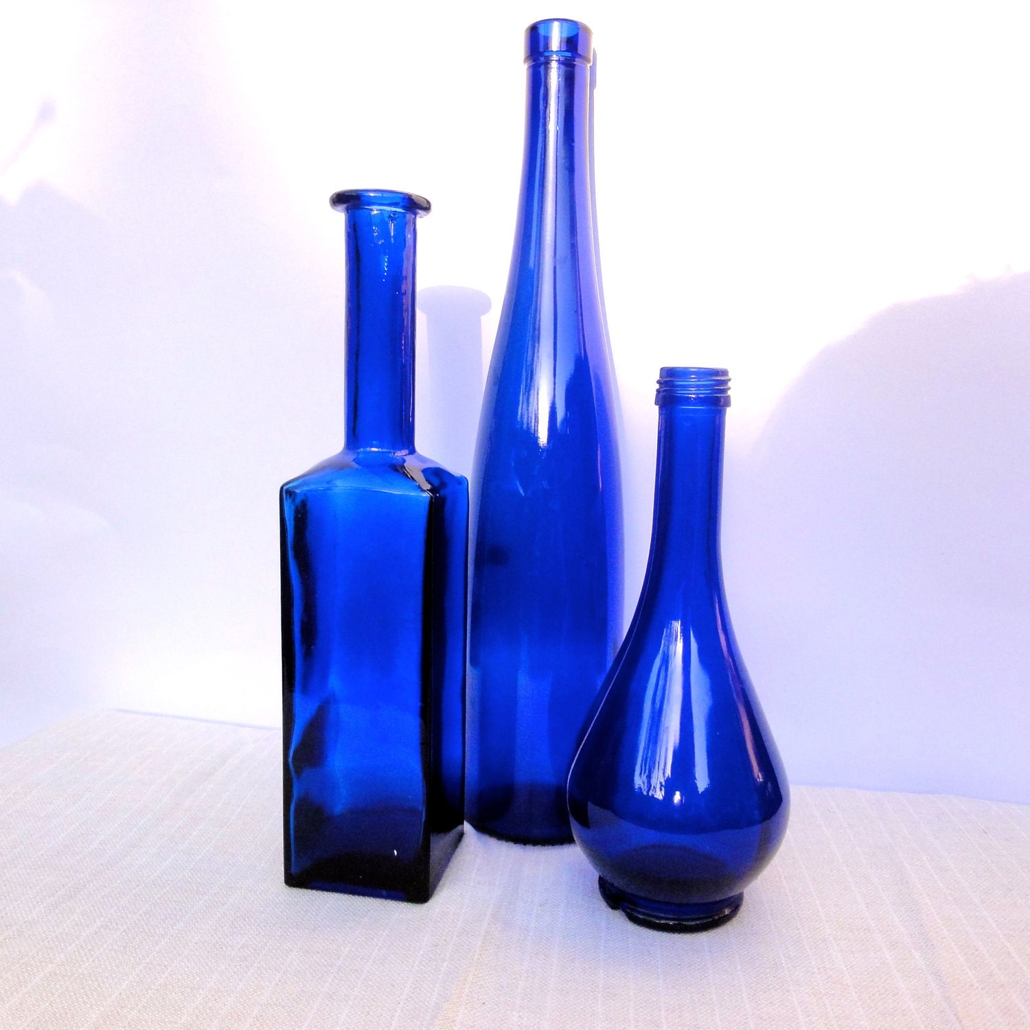 Blue Glass Bottles Set of Three Italian Vase by oldamsterdam