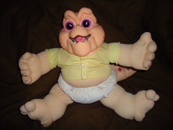 baby sinclair stuffed animal