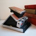 Sx-70 polaroid camera