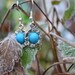 Stargate' charm earring with turquoise bead- Cancer Charity