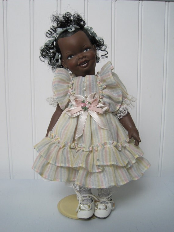 Black Americana Porcelain Doll with stand