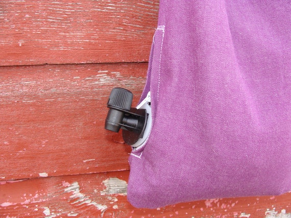 purse with wine spigot