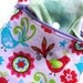 Small wet bag Bright and colorful birds on Lavendar