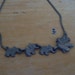 Line of Grey elephants Necklace. Vintage pewter.