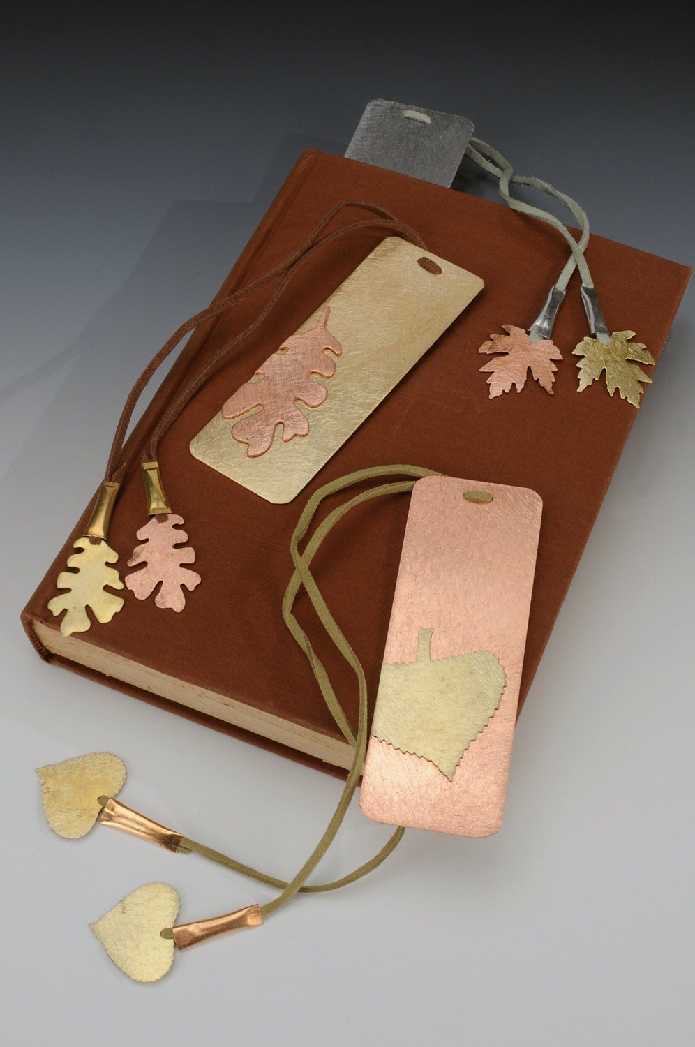 handmade bookmarks in brass and copper w leaf designs