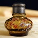 Two flowered bottles-Jlona and vintage Decorated with pinkish/orange, blue, and white flowers