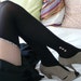 Stockings with Liberty garter and "ankle-boot like" buttons