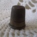 Vintage brass thimble sewing notion 1900's marked