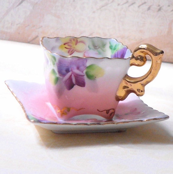miniature china cups and saucers