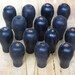10 vintage black toy part knobs or handles from Elizabeth Rosen