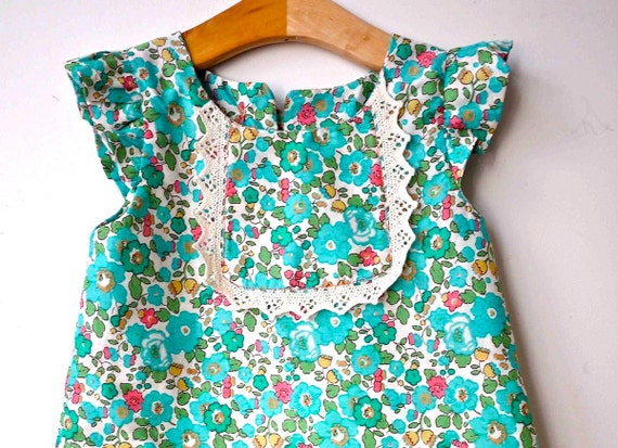 Items similar to Green Betsy Liberty fabric with lace detail spring ...
