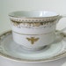 reCYCLEd tea cup and saucer with honey bee