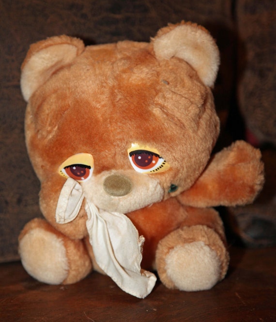 sad and happy stuffed animal