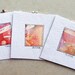 Handmade Paper hand painted original with beaded spine art card. Set of 3. Abstract designs, red, yellow.