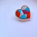 Geometric heart brooch embroidered traingles red blue violet and ice blue colorblock