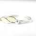 Delicate stacking rings. Leaf and berry. Sterling silver and gold brass