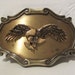Bald eagle with Caught Fish Belt Buckle Brass plate with enamel by Raintree 1980