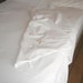 Vintage unbleached cotton sheet.Hand embroidered soft cream color, large size