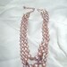 IN THE PINK Vintage Costume Jewelry Faux Pearl and Crystal Three Stranded Necklace in Precious Pink Color in very good condition