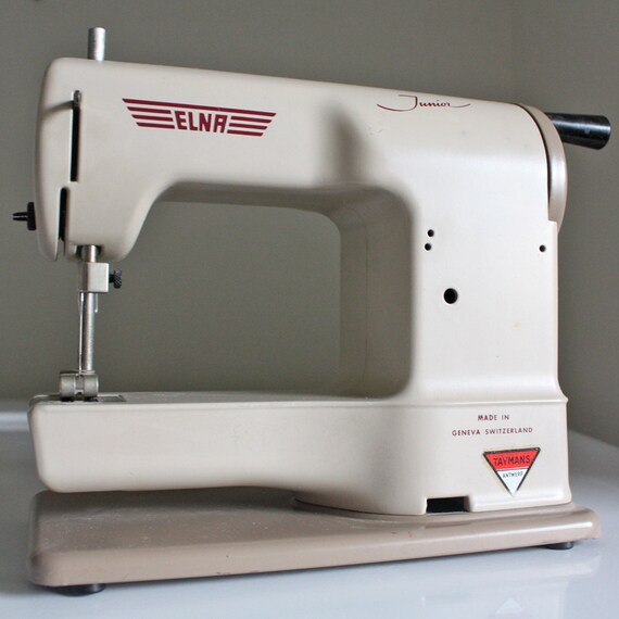 Vintage toy Elna sewing machine made in Geneva Switzerland