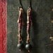 Bohemian gypsy dangle earrings - textile wrapped, black glass bead and hammered oxidised copper