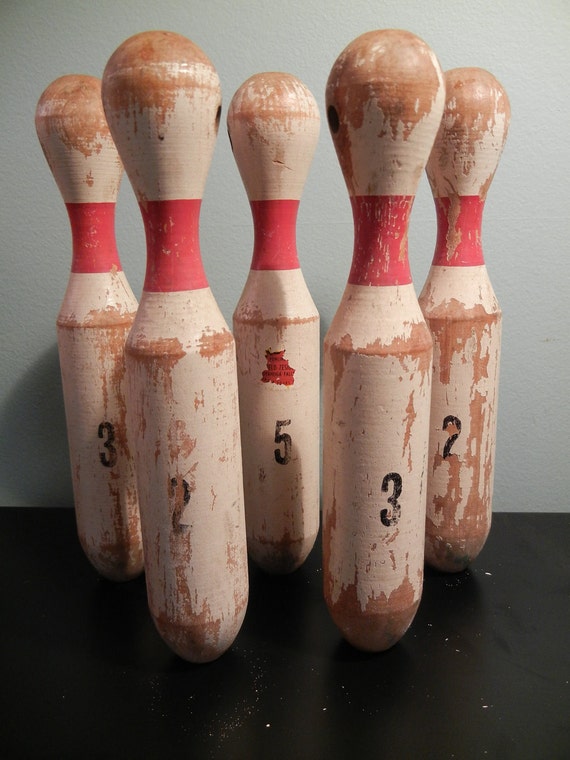 Vintage set of wooden carnival game bowling pins