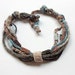 Handmade knitted necklace with bamboo beads, beige brown blue, OOAK