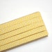 LAST ONE: yellow w/ white dots - double fold, bias tape - 4 yards, 3/8" wide