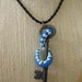 Octopus Tentacle with Antique Key