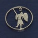 Coin cut charm. Final Fantasy char Sephiroth. One winged angel.