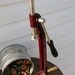 Vintage Maroon Bottle Capper with 163 Various Bottle Caps