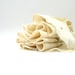 Cobweb felted scarf from white wool with silk fibers
