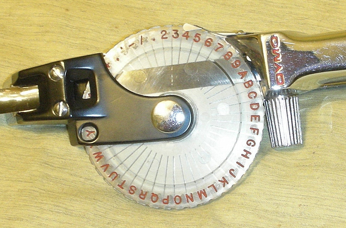 vintage DYMO tapewriter label embossing set with additional